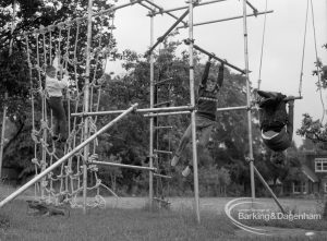 Child Welfare at Woodstock Hall House, Harold Wood, showing children on climbing apparatus, 1968