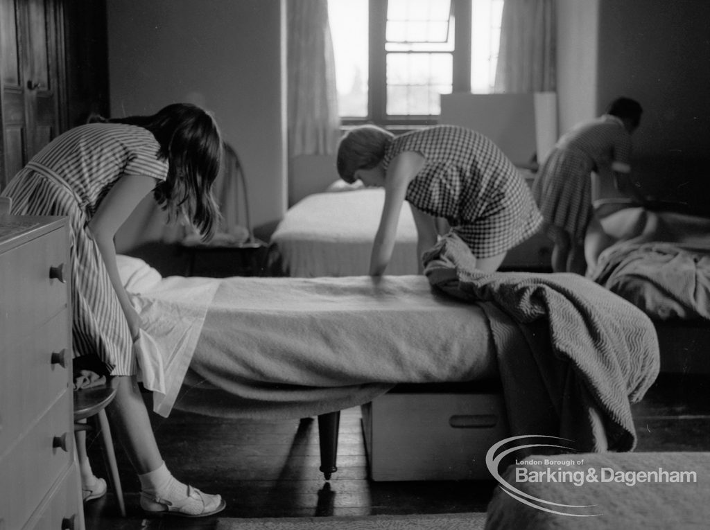 Child Welfare at Tudor House, 212 Becontree Avenue, Dagenham, showing girls making beds, 1968