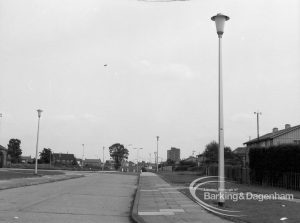 View from Mr and Mrs Whithead’s flat at 92 Thaxted House, Siviter Way, Dagenham, showing street lighting in Church Lane and Ballards Road roundabout area and beyond, 1968