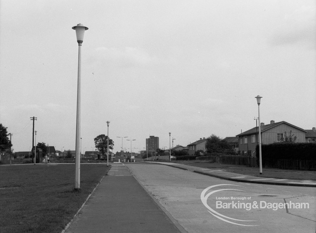 View from Mr and Mrs Whithead’s flat at 92 Thaxted House, Siviter Way, Dagenham, showing street lighting in Church Lane and Ballards Road roundabout area and beyond, 1968