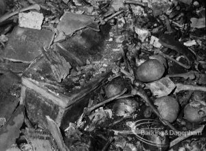 St Margaret’s Church, Barking, showing skulls and bones to south-east of centre of the Cambell family vault [remains of coffin only to south-west], following discovery of lead coffin and bones of Sir Thomas Cambell, 1968