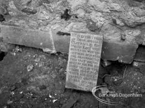 St Margaret’s Church, Barking, showing the engraved tablet dislodged by workmen from interior of the Cambell family vault, and preparation of new course for drain, following discovery of lead coffin and bones of Sir Thomas Cambell, 1968