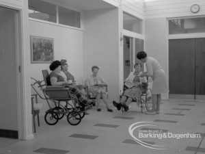 Welfare, showing Leys Avenue Occupational Centre for the Physically Handicapped, Dagenham, with patients seated in main hall and member of staff, 1968