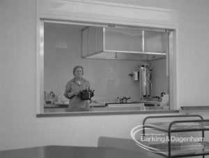 Welfare, showing Leys Avenue Occupational Centre for the Physically Handicapped, Dagenham, with serving hatch in the canteen and a member of staff holding teapot, 1968