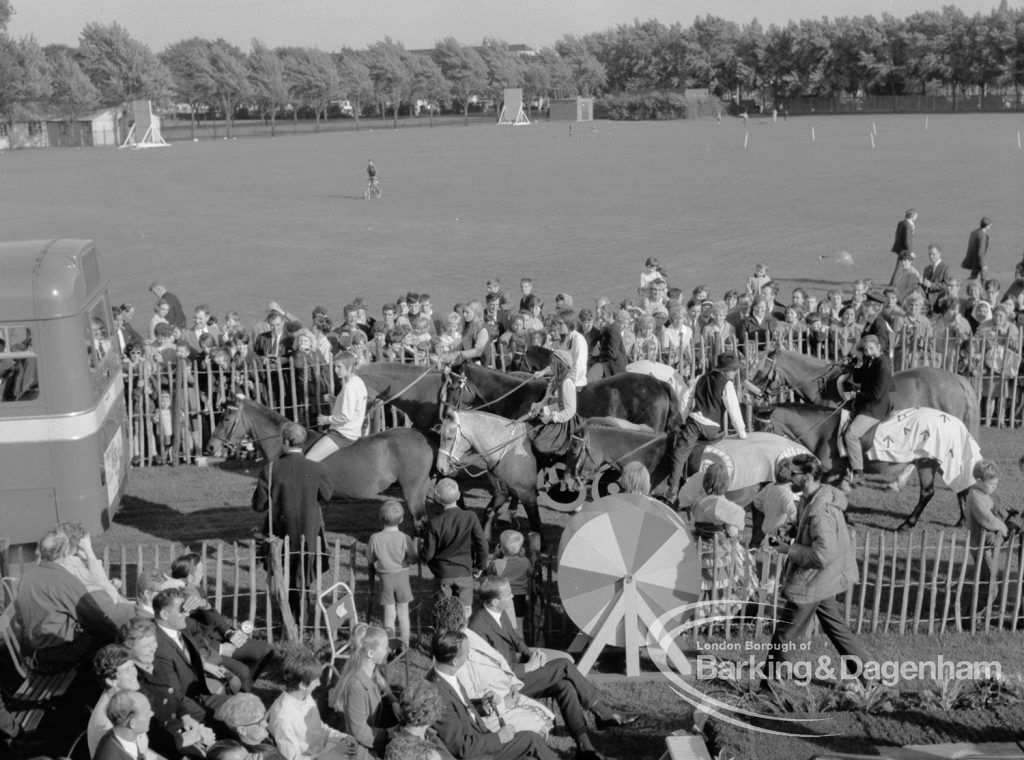 Barking Carnival 1968, showing the raffle drum, horses with riders, and crowd, 1968