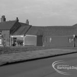 Dagenham Village redevelopment, showing Crown Street with some remaining properties on north side and junction with Rainham Road South, 1968 – 1969