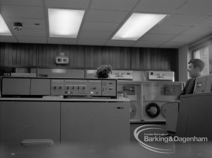 London Borough of Barking, Treasurer’s Department Computer Room at Civic Centre, Dagenham, looking south, with equipment and members of staff, 1969