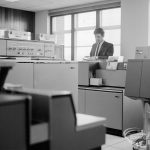 London Borough of Barking, Treasurer’s Department Computer Room at Civic Centre, Dagenham, looking south-west, with equipment and member of staff, 1969