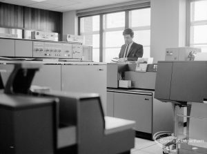 London Borough of Barking, Treasurer’s Department Computer Room at Civic Centre, Dagenham, looking south-west, with equipment and member of staff, 1969