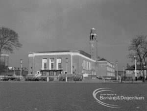 Barking Assembly Hall taken from green on south-east, with Town Hall clocktower in background and trees on either side, 1969