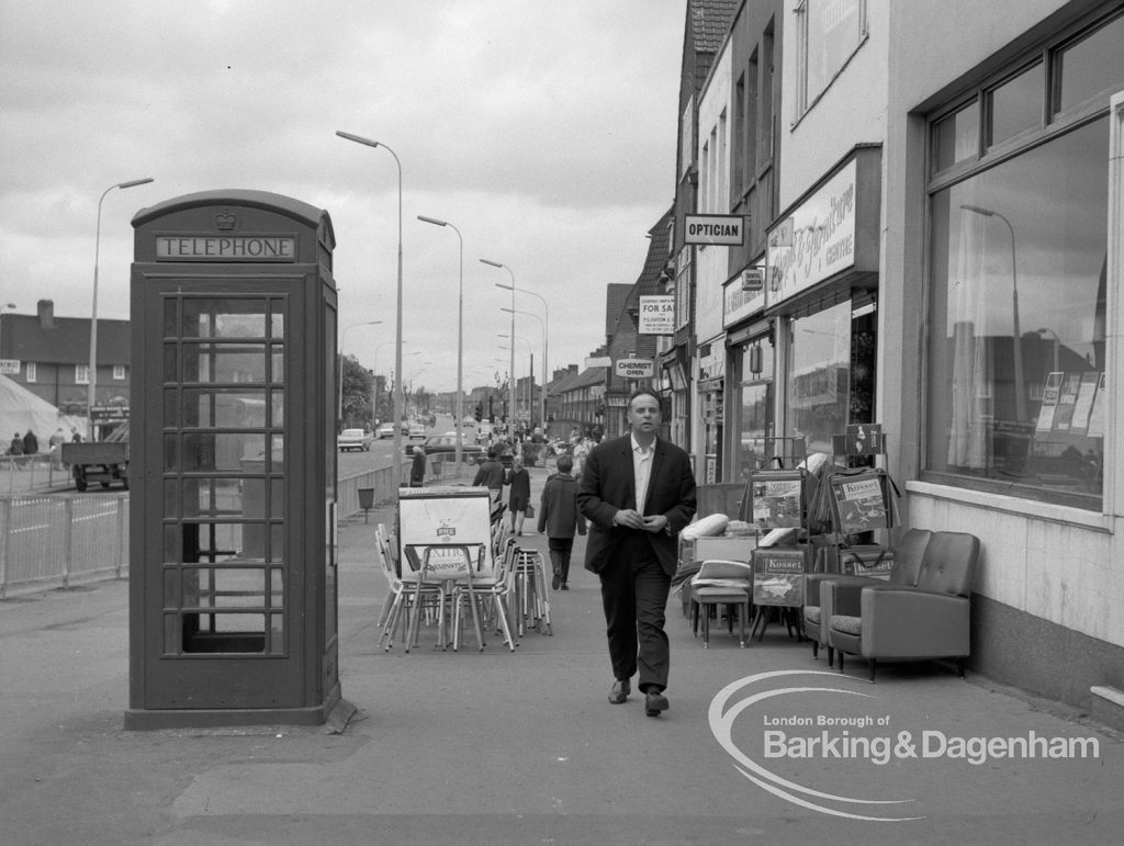 London Borough of Barking Shops Act Inspector, showing furniture obstructing pavement at 274 Heathway, Dagenham, looking north, with owner approaching, 1969