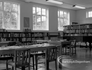 London Borough of Barking Rectory Library, Dagenham, showing view in adult section looking north to Reference bookshelves and grand piano, 1969