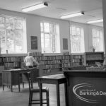London Borough of Barking Rectory Library, Dagenham, showing view in adult section looking south to bookshelves and enquiry desk, 1969