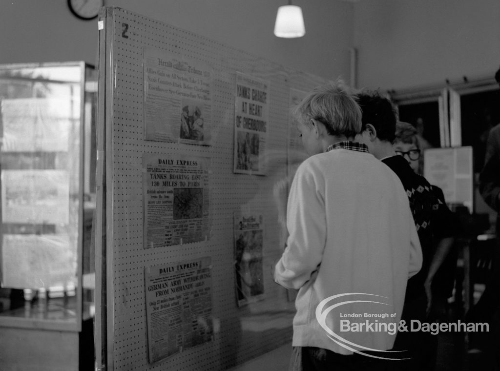 London Borough of Barking exhibition of historical Second World War newspapers and visitors at Valence House Museum, Dagenham, 1969