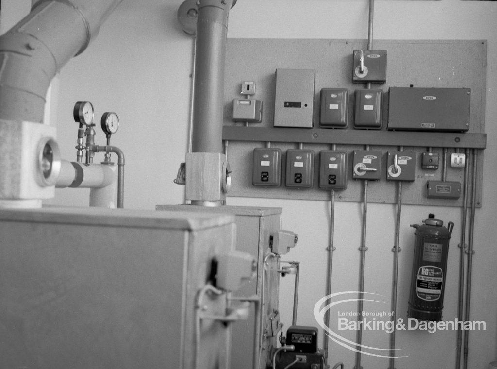 London Borough of Barking Borough Heating Engineer, showing boiler house with boiler and panel at Becontree Heath housing, 1969
