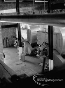 London Borough of Barking Borough Heating Engineer, showing view from floor above looking down in boiler house at Salvage Plant, 1969