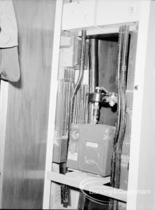London Borough of Barking Borough Heating Engineer, showing meter in cupboard and taken by flashlight, 1969