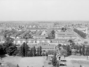 Panoramic view from Parkside House, Bell Farm Avenue, Dagenham, showing car park in foreground and tree-lined Bull Lane on right edge, 1969