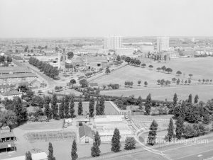 Panoramic view from Parkside House, Bell Farm Avenue, Dagenham, showing sewage works (left centre) and London Borough of Barking greenhouses (foreground), 1969