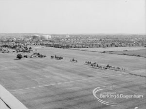 Panoramic view from Parkside House, Bell Farm Avenue, Dagenham, showing the expanse of Central Park, with the gasholders (top left), 1969