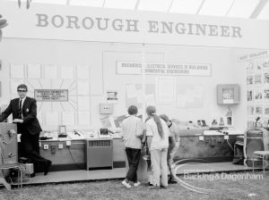Dagenham Town Show 1969, showing Mechanical and Electrical Environmental Services display and onlookers on Borough Engineer stand, 1969