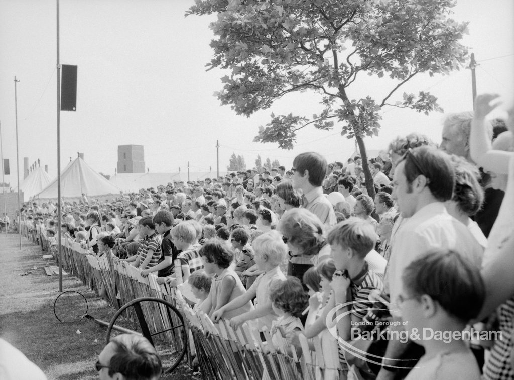 Dagenham Town Show 1969, showing section of crowd behind fence watching events in Arena, 1969