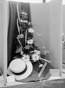 Dagenham Town Show 1969, showing exhibit of flowers with straw hat in Flower Arrangement exhibition, 1969