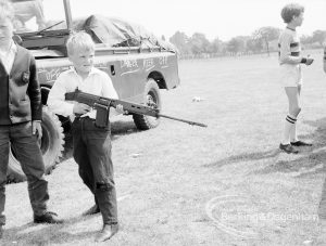 Dagenham Town Show 1969, showing Army display with boy holding rifle, 1969