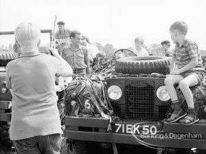 Dagenham Town Show 1969, showing Army display with man and boy looking at vehicle, 1969