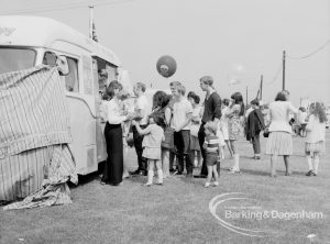 Dagenham Town Show 1969, showing parents and children queueing at ice cream van, 1969