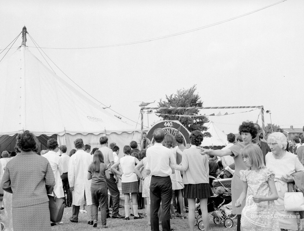 Dagenham Town Show 1969, showing crowd watching Becontree Wheelers cyclists on speed rollers, 1969