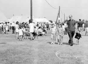 Dagenham Town Show 1969, showing visitors including father and youngsters in the main Avenue, 1969