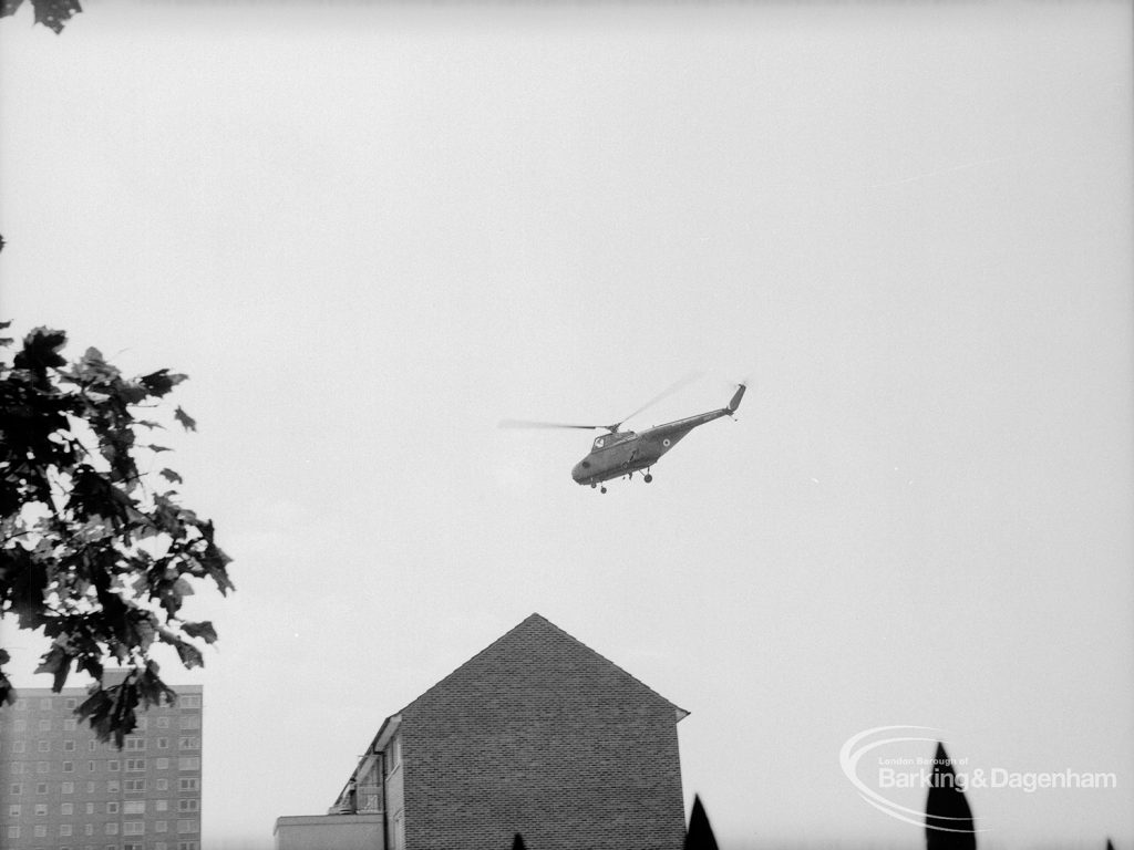 Dagenham Town Show 1969, showing helicopter approaching housing estate, 1969