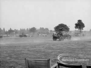 Dagenham Town Show 1969, showing soldiers in armoured vehicles manoeuvring at speed, 1969