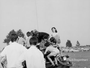 Dagenham Town Show 1969, showing a group of children and young people clustered around vehicle, 1969