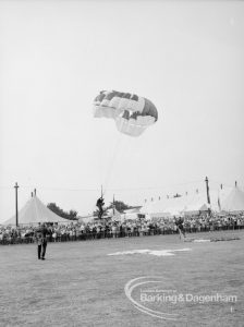 Dagenham Town Show 1969, showing parachutist making pin-point landing after parachute jump, 1969