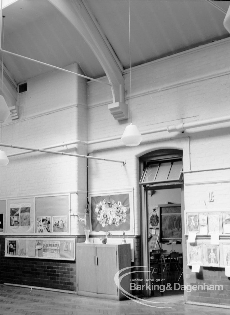 St Chad’s Infant School, Japan Road, Chadwell Heath (building ceasing to be used as school), with west side of main hall, with doorway, decorated wall and cupboard, 1969