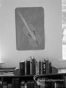 London Borough of Barking, Rectory Library, Dagenham, showing ‘Music’ poster with diagonal violin by Egbert Smart on wall, 1969