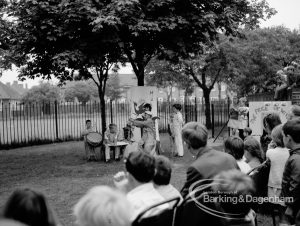 Rectory Library, Dagenham production of ‘The Price of Wisdom’ in grounds of library, produced by Mrs Jean Hickman, showing view over spectators to ‘stage’ under trees, 1969