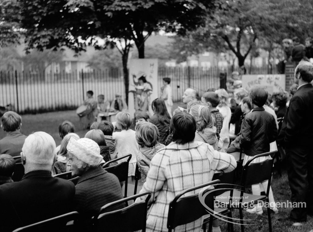 Rectory Library, Dagenham production of ‘The Price of Wisdom’ in grounds of library, produced by Mrs Jean Hickman, showing rear view of audience watching performance, 1969