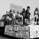 Crowds on a carnival float at the Barking Carnival, 1969