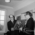 Barking and Dagenham Chamber of Trade and Industry showing President Mr Andrews and Mayor Vic Rusha displaying framed insignia in Museum Room, Valence House, Dagenham, 1970