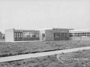 New William Bellamy Primary School, Becontree Heath, showing Central Hall [closer building] and east wing, 1970