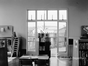 Rectory Library, Dagenham, showing view from children’s section through French windows at rear, 1970