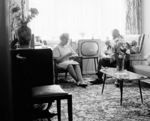 Housing at Grand Courts, Valence Wood Road, Dagenham, showing view of television and width of lounge at flat, 1970