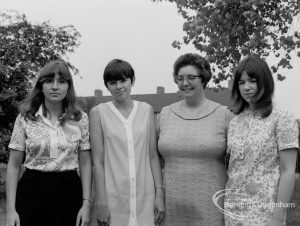 London Borough of Barking Libraries staff at Rectory Library, showing Miss Ann Long, Miss Pat Parlour, Miss Hilda Godfrey, and Miss Jean Towler in grounds of library, 1970