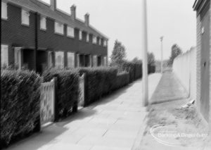 Mayesbrook housing for elderly people in Bevan Avenue, Barking, showing row of houses along alley looking north to railway, 1970