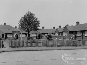 Housing at Pembroke Gardens, Dagenham, showing bungalows for elderly people with fence along front, 1970