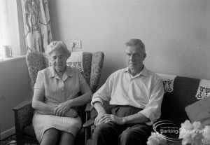 Housing at Grand Courts, Valence Wood Road, Dagenham, showing Mr and Mrs Bond seated in lounge at flat number six, 1970