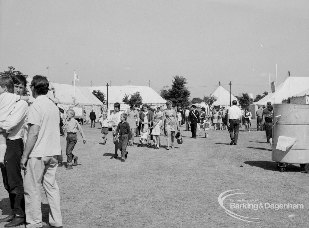 Dagenham Town Show 1970, showing visitors strolling down a main avenue, 1970